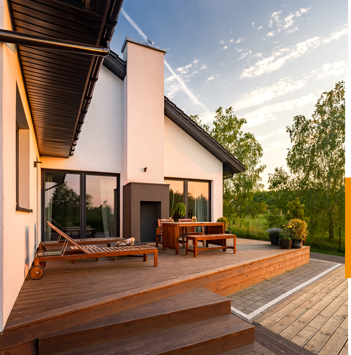 Modern house patio with wooden furniture.